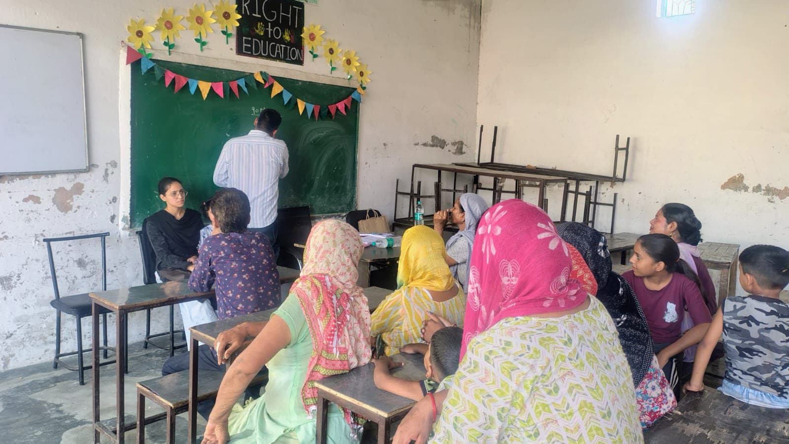 Women and children attending a Dreamwings community awareness session